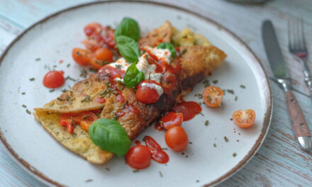 Veggie-Stuffed Omelet with Cream Cheese and Sriracha