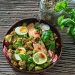 Roasted Cauliflower & Zucchini Bowl with Salmon and Spinach Lemon Pesto